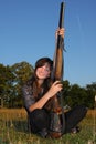 Young girl with rifle Royalty Free Stock Photo