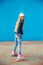 Young girl on rollerblades in the city Royalty Free Stock Photo