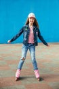 Young girl on rollerblades in the city Royalty Free Stock Photo