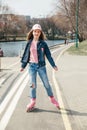 Young girl on rollerblades in the city Royalty Free Stock Photo