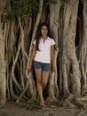 Roots of tree and young girl