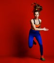 Young girl runner in silhouette on white background. Dynamic movement. Sport and healthy lifestyle.