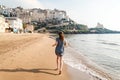 Young girl running on the beach of Sperlonga, Italy Royalty Free Stock Photo