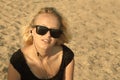 Young girl on the sandy beach Royalty Free Stock Photo