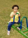 Young girl on seesaw