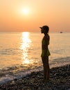 Young girl on shore sea Royalty Free Stock Photo