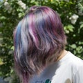 Young girl with short hair and colored hair Royalty Free Stock Photo