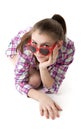 Young girl in shorts and a t-shirt on a white background Royalty Free Stock Photo