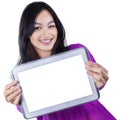 Young girl showing empty tablet screen Royalty Free Stock Photo