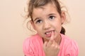 Young girl showing a missing tooth Royalty Free Stock Photo