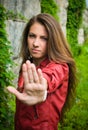 Young girl showing stop sign Royalty Free Stock Photo