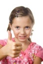 Young girl showing thumb up