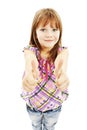 A young girl showing thumbs up with both hands Royalty Free Stock Photo