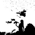 Young girl silhouette with a bird on background sunset and starry sky