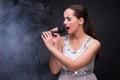 The young girl singing in karaoke club Royalty Free Stock Photo