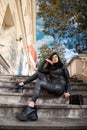 Young girl sits on the stairs. Beautiful woman. Poland. Warsaw