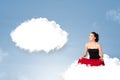 Young girl sitting on cloud and thinking of abstract speech bubble with copy space Royalty Free Stock Photo