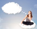 Young girl sitting on cloud and thinking of abstract speech bubble with copy space Royalty Free Stock Photo