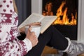 Winter Comfort: Cozy Evening by the Fireplace Royalty Free Stock Photo