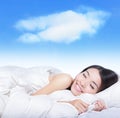 Young girl sleeping on a pillow with white cloud Royalty Free Stock Photo