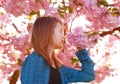 Young girl smelling blossoms Royalty Free Stock Photo