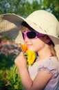 Young girl smelling flowers Royalty Free Stock Photo