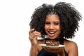 Young girl smiling while holding a dessert Italian straw pie