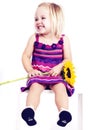 Young girl smiling with sunflower Royalty Free Stock Photo