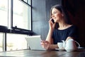 Young girl smilling and talking on mobile phone Royalty Free Stock Photo