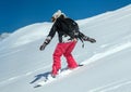 Snowboarder moving down Royalty Free Stock Photo