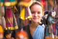 Young girl in a souvenir shop in Kathmandu. Travel. Royalty Free Stock Photo