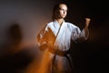 Young girl in a sports kimono in the image of judo. Royalty Free Stock Photo