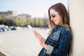 Young girl standing on the college campus yard studying Royalty Free Stock Photo