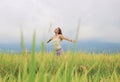 A Girl Deep Breathing in the Rice Field