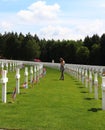 Teenage girl honoring WWII soldiers in Luxembourg