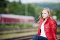 Young girl at the station Royalty Free Stock Photo