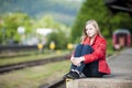 Young girl at the station Royalty Free Stock Photo