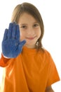 Young girl with stop hand painted in blue Royalty Free Stock Photo