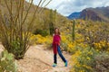 Young Girl Stopped On Hiking Trail