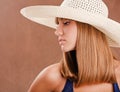 Young girl in a straw hat