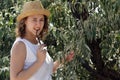 Young girl in a straw hat Royalty Free Stock Photo