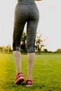 Young girl is stretching before running, training concept Royalty Free Stock Photo