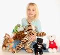 Young girl and stuffed animals Royalty Free Stock Photo