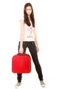 Young girl with suitcase on a white background Royalty Free Stock Photo