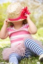 Young Girl In Summer Dress Sitting In Field Royalty Free Stock Photo