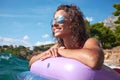 Young girl sunbathing on Adriatic waters