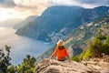 Young girl on Positano coast background, Amalfi, Italy