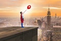 The young girl in superhero costume overlooking the city Royalty Free Stock Photo