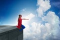 The young girl in superhero costume overlooking the city Royalty Free Stock Photo