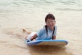 Young girl in the surf Royalty Free Stock Photo